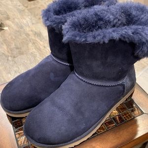 Navy blue Ugg boots with corduroy bow